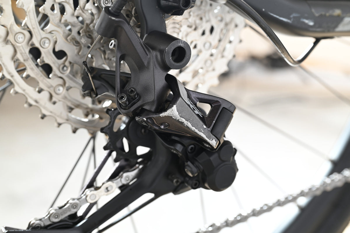 Dérailleur arrière noir Loop Sports KTM Power Sport 12 Plus avec traces d'usure sur le mécanisme