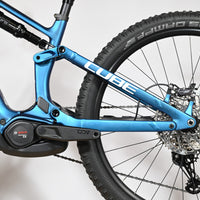 Velo electrique VTT Loop Sports Cube Stereo Hybrid bleu avec moteur Bosch Performance CX et suspension Fox
