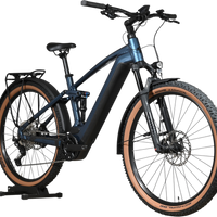 Velo electrique tout-suspendu Loop Sports Cube Stereo Hybrid 120 Race Allroad bleu avec pneus a flancs tan