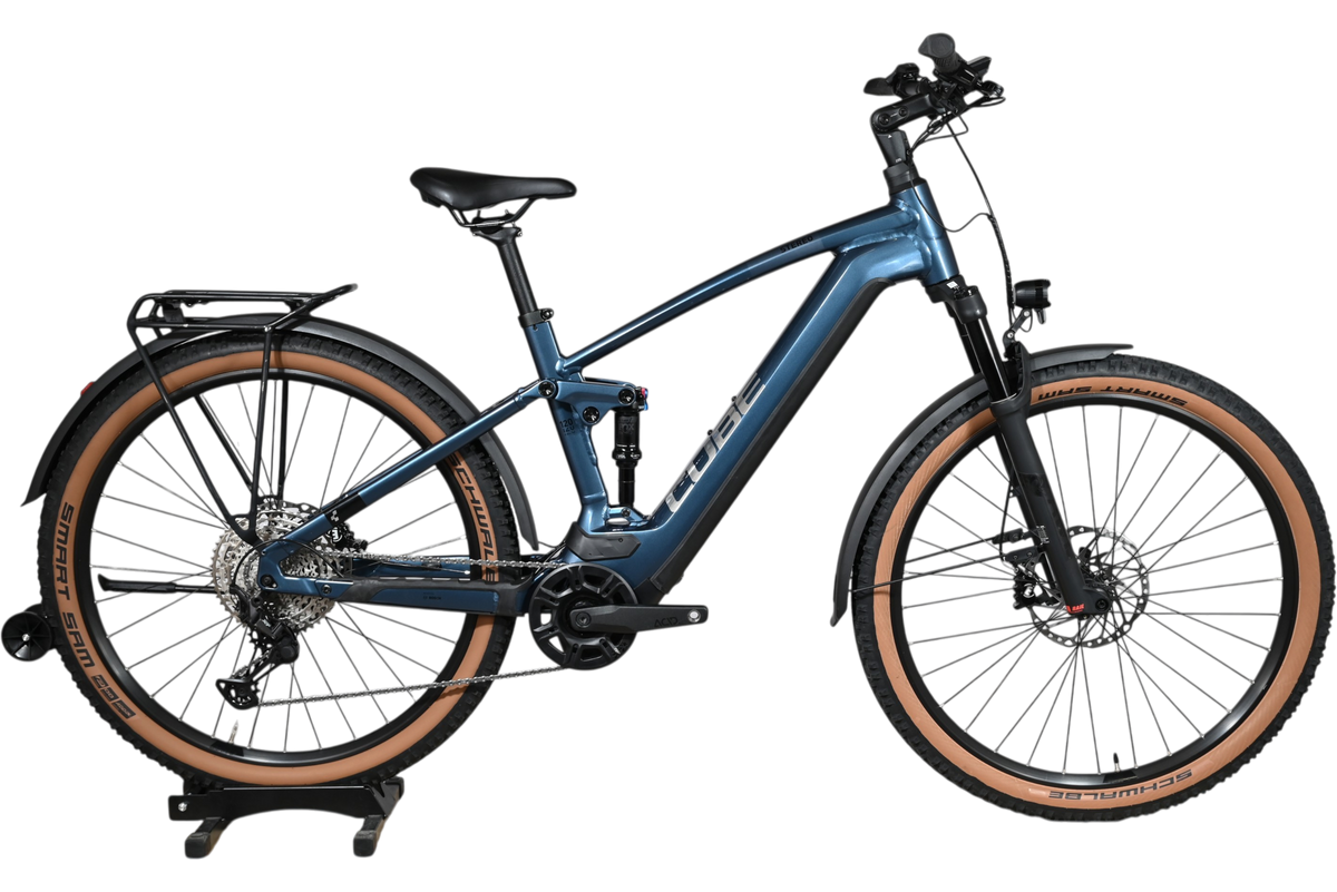 Velo electrique tout-suspendu Loop Sports Cube Stereo Hybrid 120 Race Allroad bleu avec pneus a flancs marron