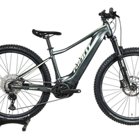 Velo electrique tout-terrain Giant Fathom E+1 gris de Loop Sports, taille S, avec pneus Hutchinson et cadre robuste.
