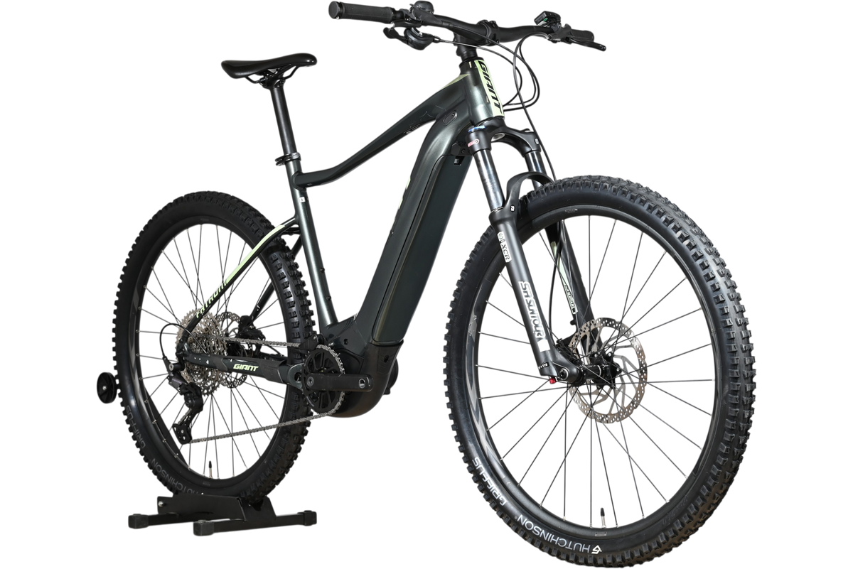 VTT électrique Giant Fathom E+1 2022 gris foncé de Loop Sports avec suspension avant et pneus tout-terrain