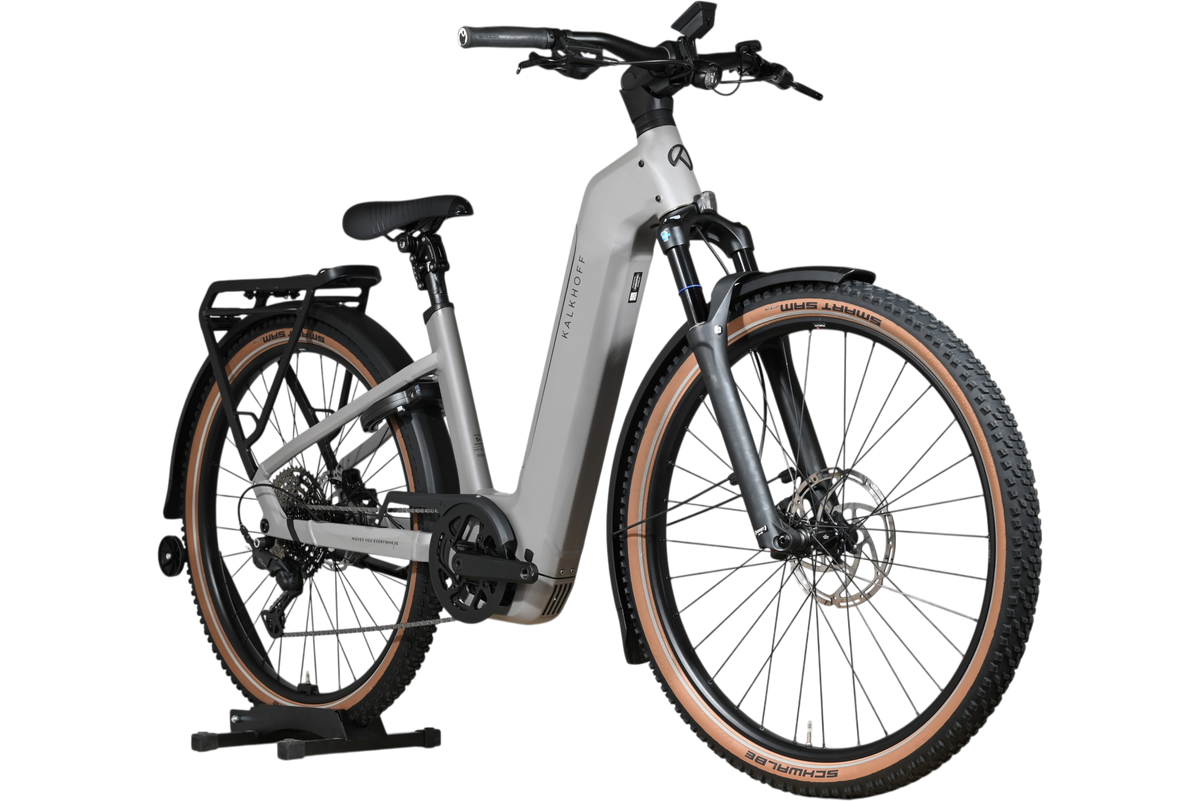 Vélo électrique Kalkhoff Entice 5+ Advance gris Loop Sports avec pneus tout-terrain et porte-bagages arrière