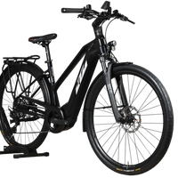Vélo électrique KTM Macina Premium noir de Loop Sports avec porte-bagages et pneus tout-terrain