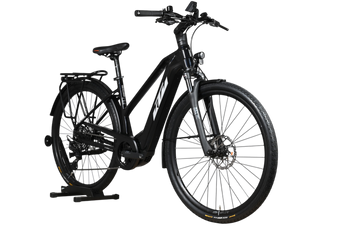 Vélo électrique KTM Macina Premium noir de Loop Sports avec porte-bagages et pneus tout-terrain