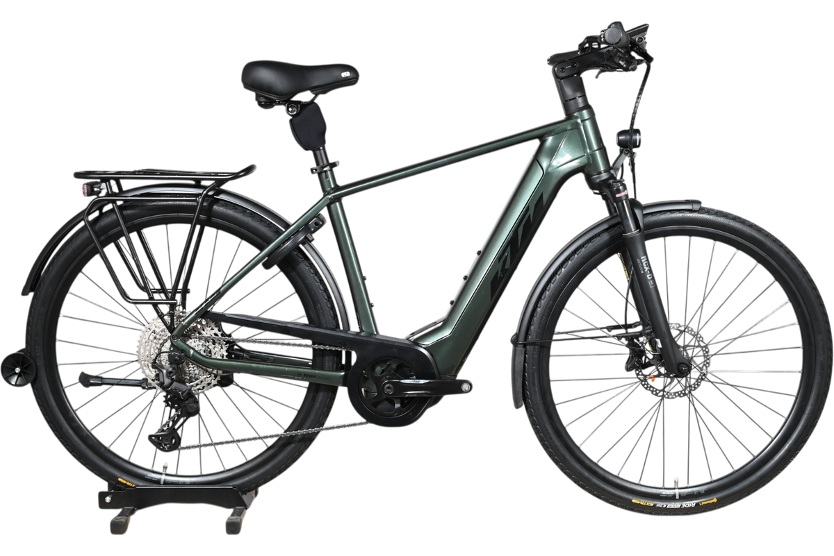 Vélo électrique KTM Macina Style 720 Loop Sports vert foncé avec porte-bagages et pneus tout-terrain