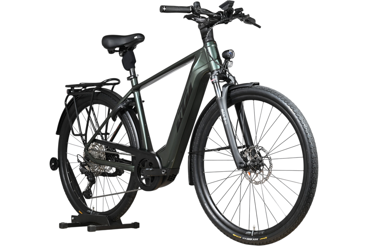 Vélo électrique KTM Macina Style 720 Loop Sports vert foncé avec porte-bagages et pneus tout-terrain