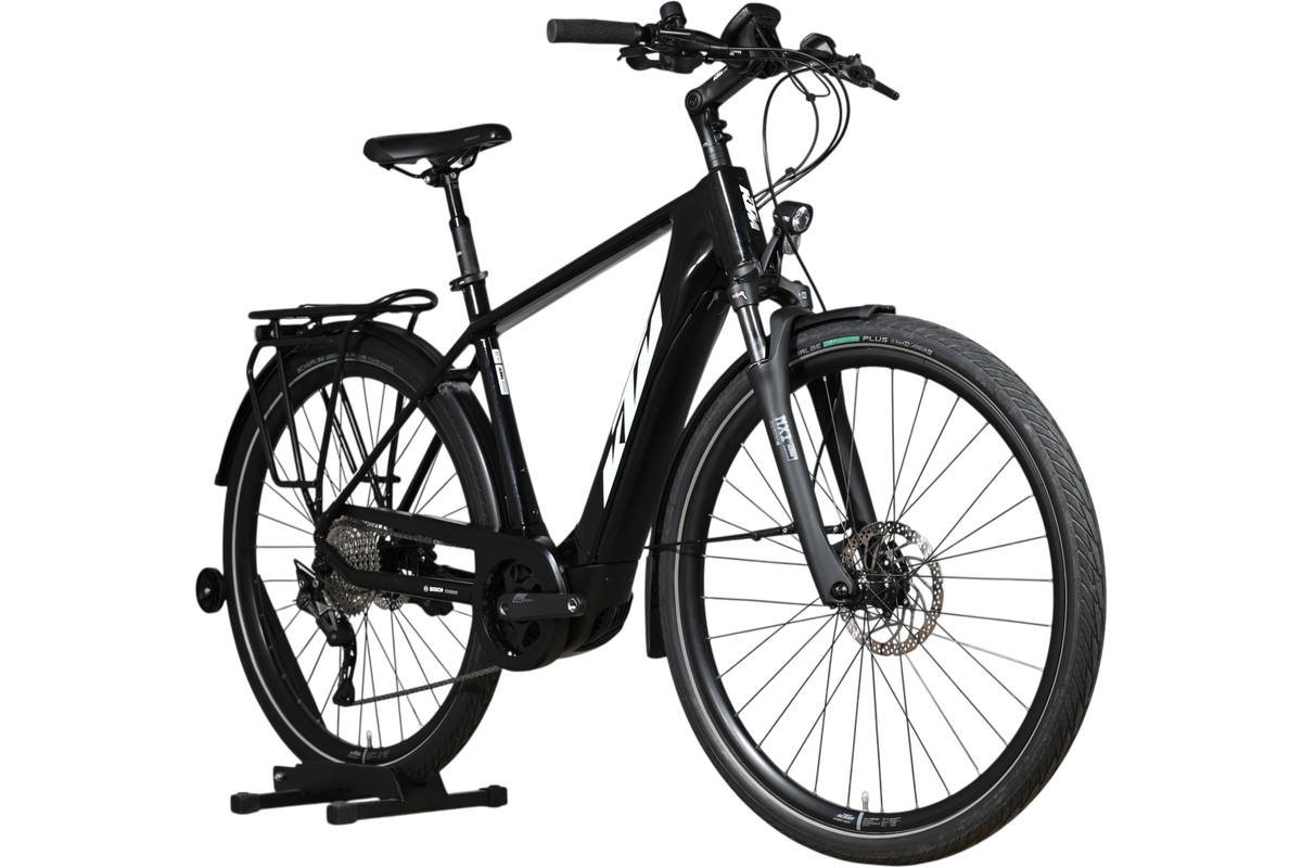 Vélo électrique Loop Sports KTM Macina Tour CX 625 LTD noir avec porte-bagages et moteur Bosch