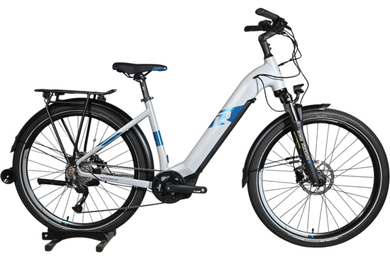 Vélo électrique Loop Sports Raymon Tourray E 5.0 gris et bleu avec porte-bagages et fourche suspendue