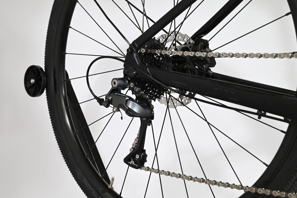 Transmission arrière et dérailleur Shimano du vélo Scott Metrix 30 EQ 2024 noir chez Loop Sports