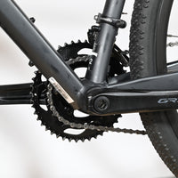 Gros plan sur le pédalier Shimano GRX noir du vélo gravel Scott Speedster Gravel 10 2025 chez Loop Sports