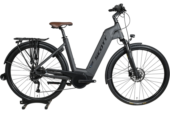 Vélo électrique Scott Sub Active 20 gris mat de Loop Sports avec selle marron, porte-bagages et pneus tout-terrain