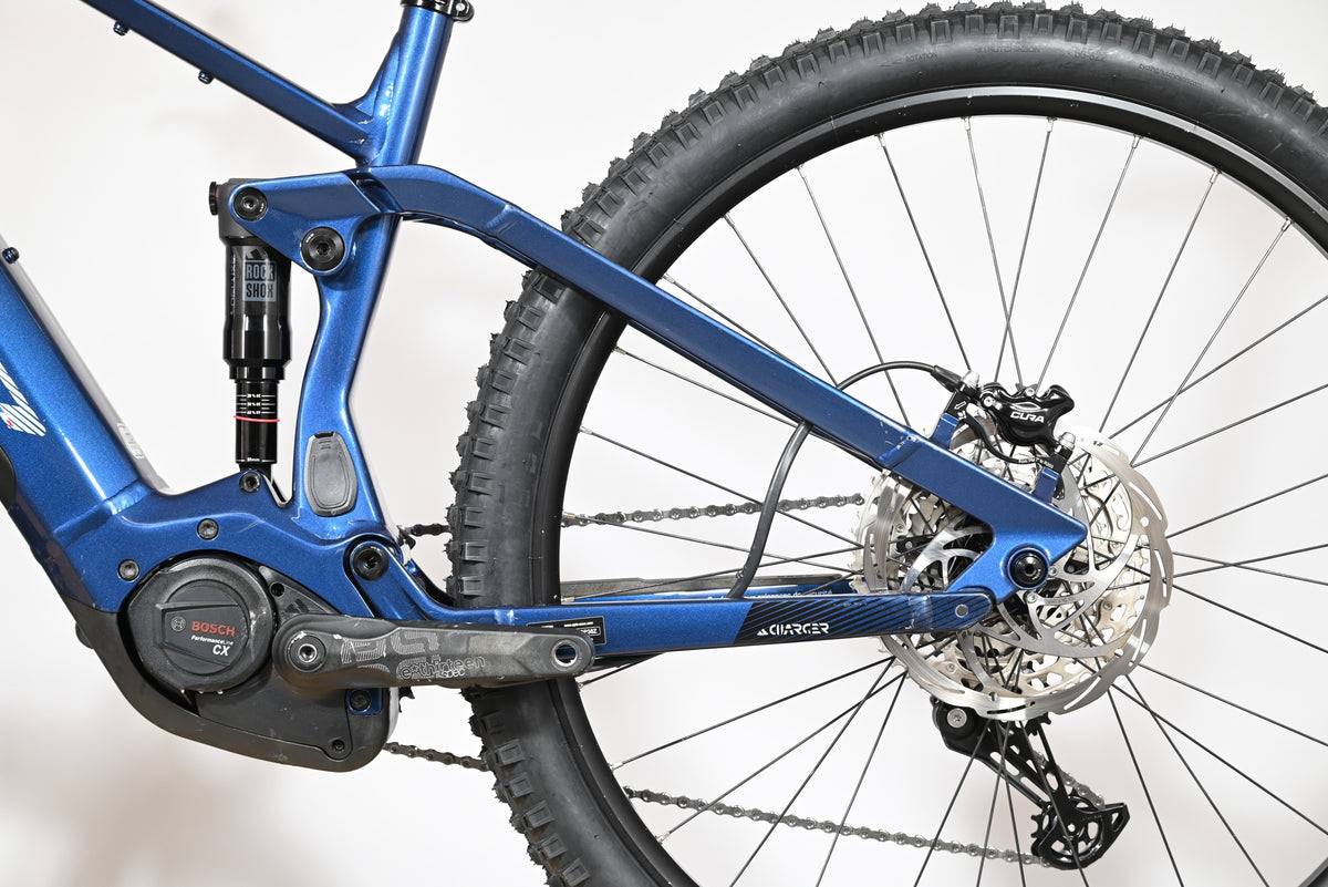 Velo electrique tout-suspendu Sunn Charger S1 bleu par Loop Sports avec moteur Bosch et amortisseur RockShox