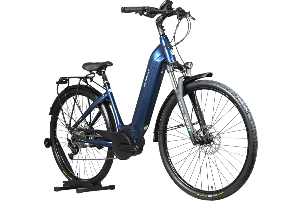 Vélo électrique bleu Loop Sports Velodeville AEB890 avec cadre ouvert, porte-bagages et pneus Continental