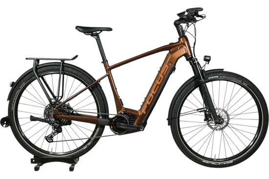 Vélo électrique Focus Aventura 6.8 marron de Loop Sports avec porte-bagages et pneus tout-terrain