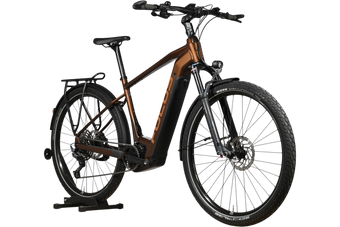 Vélo électrique Focus Aventura 6.8 marron de Loop Sports avec porte-bagages, garde-boue et pneus tout-terrain