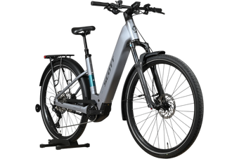 Vélo électrique Scott Axis 10 2026 gris avec cadre robuste, porte-bagages et pneus tout-terrain chez Loop Sports