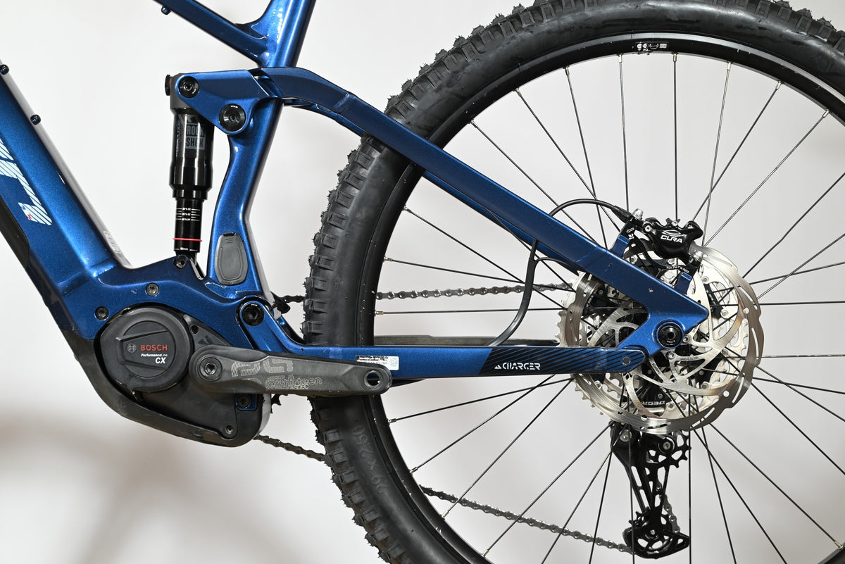 Velo electrique tout-suspendu Sunn Charger S1 bleu de Loop Sports avec moteur Bosch Performance Line CX