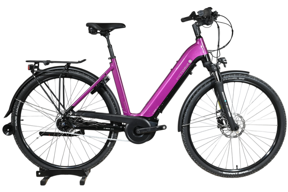 Velo electrique Loop Sports Victoria Trekking 11.5 violet avec cadre ouvert, porte-bagages et pneus tout-terrain