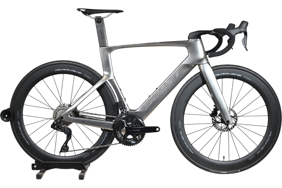 Vélo de route aérodynamique Loop Sports Scott Foil RC Ultimate gris avec roues en carbone Dura-Ace