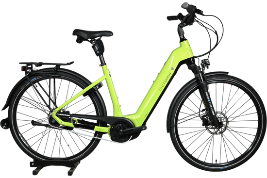 Vélo électrique Victoria eManufaktur 11.7 vert lime de Loop Sports avec cadre ouvert et porte-bagages arrière