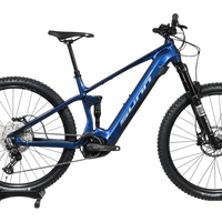 VTT électrique tout-suspendu Sunn Charger S1 2025 bleu de Loop Sports avec pneus Hutchinson et fourche RockShox
