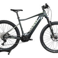 VTT électrique Giant Fathom E+1 2022 gris avec détails vert lime, disponible chez Loop Sports