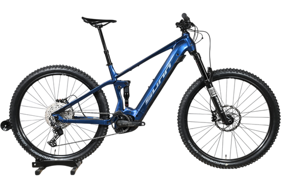 VTT électrique Sunn Charger S1 2025 bleu sur socle en bois chez Loop Sports