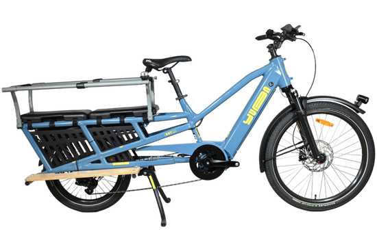 Vélo cargo électrique bleu Yuba Spicy Curry Family Edition 2025 chez Loop Sports avec porte-bagages arrière